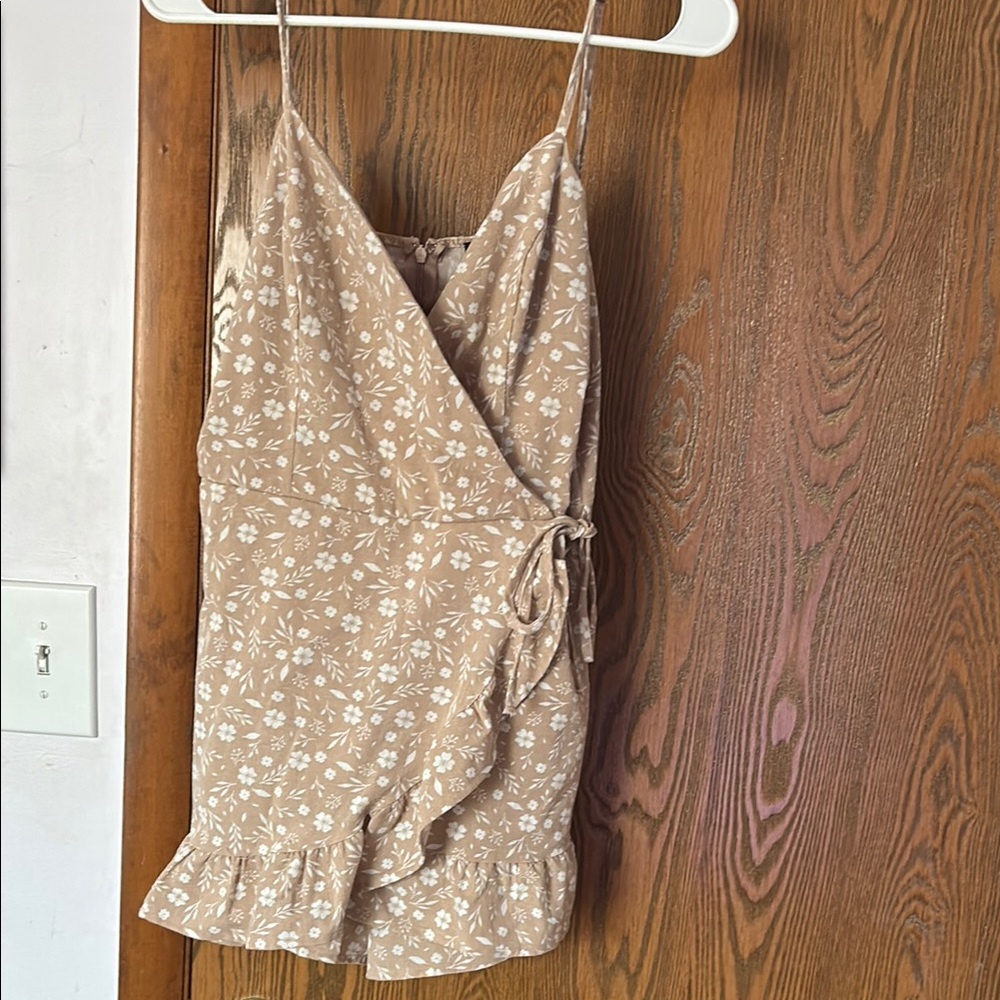 Blashe Floral Wrap short Jumper with Ruffle Hem. Size (M).